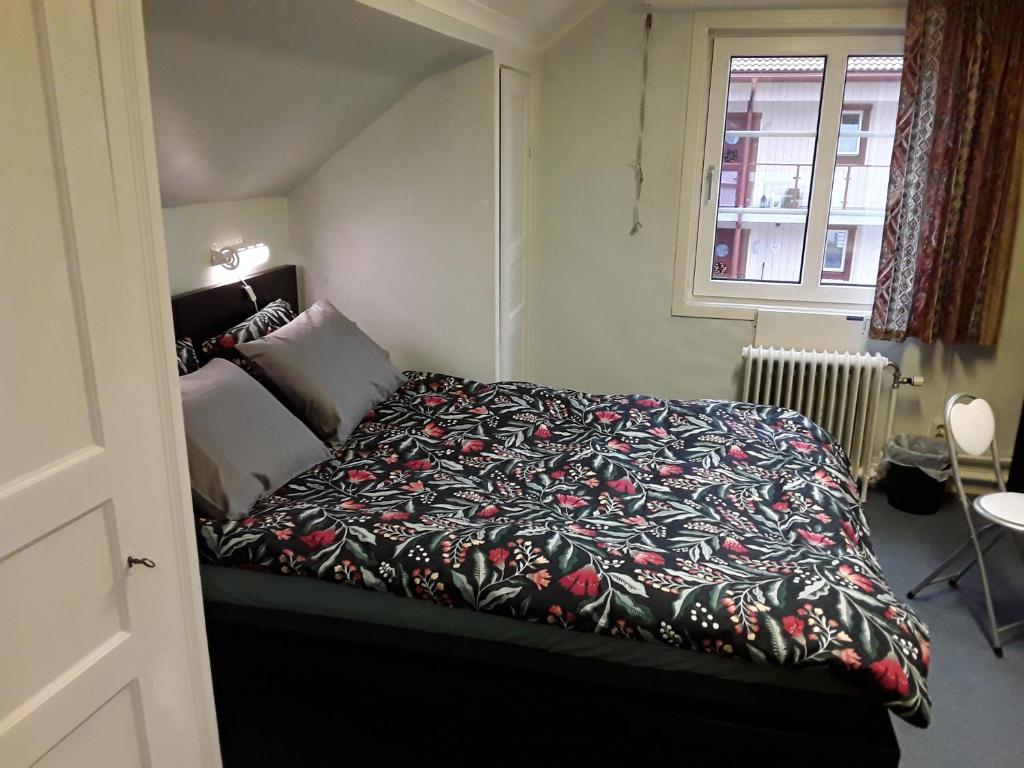 Postel nebo postele na pokoji v ubytování Knihsgården