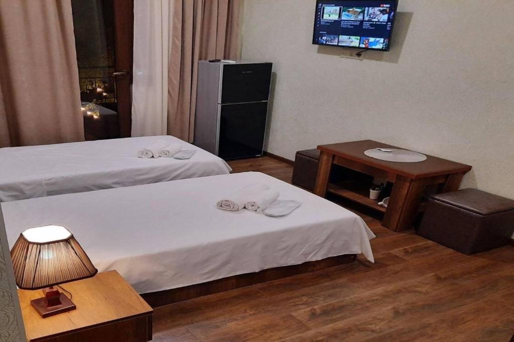 Postel nebo postele na pokoji v ubytování Hotel Goldenera