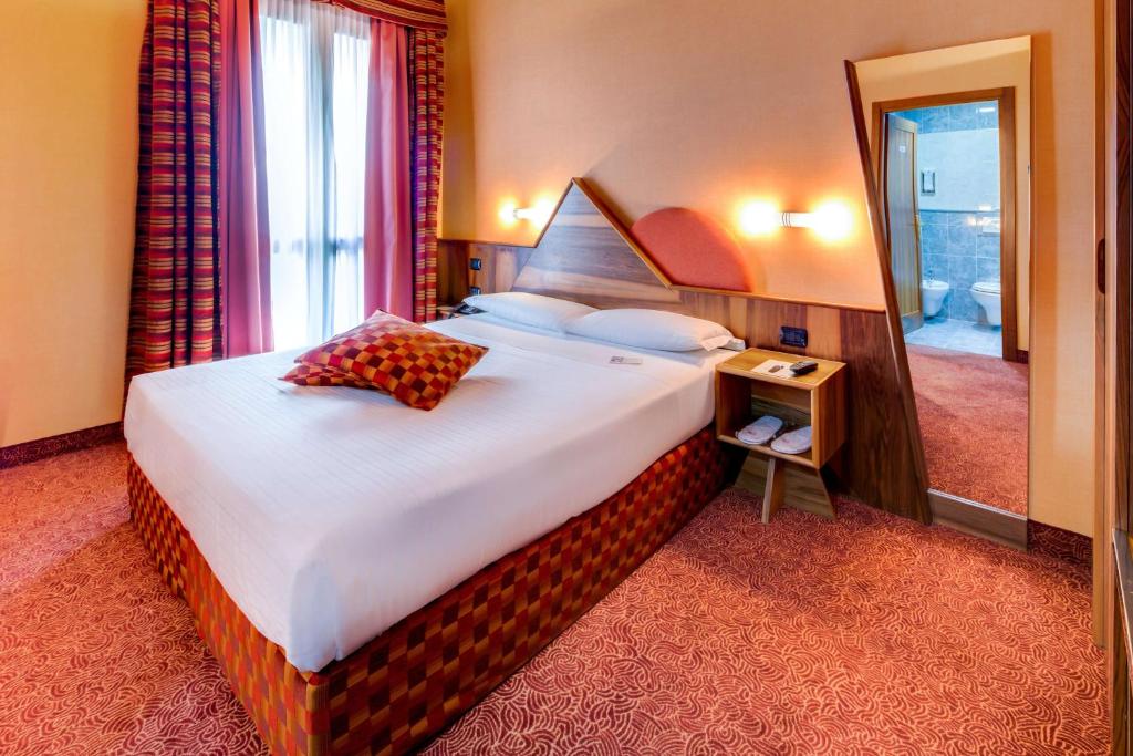 Postel nebo postele na pokoji v ubytování La Villa - Sure Hotel Collection by Best Western