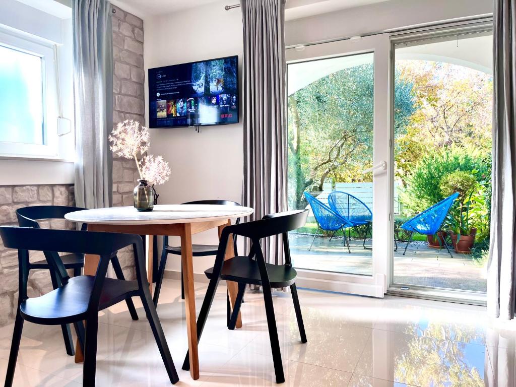 Televízia a/alebo spoločenská miestnosť v ubytovaní The Park Apartments