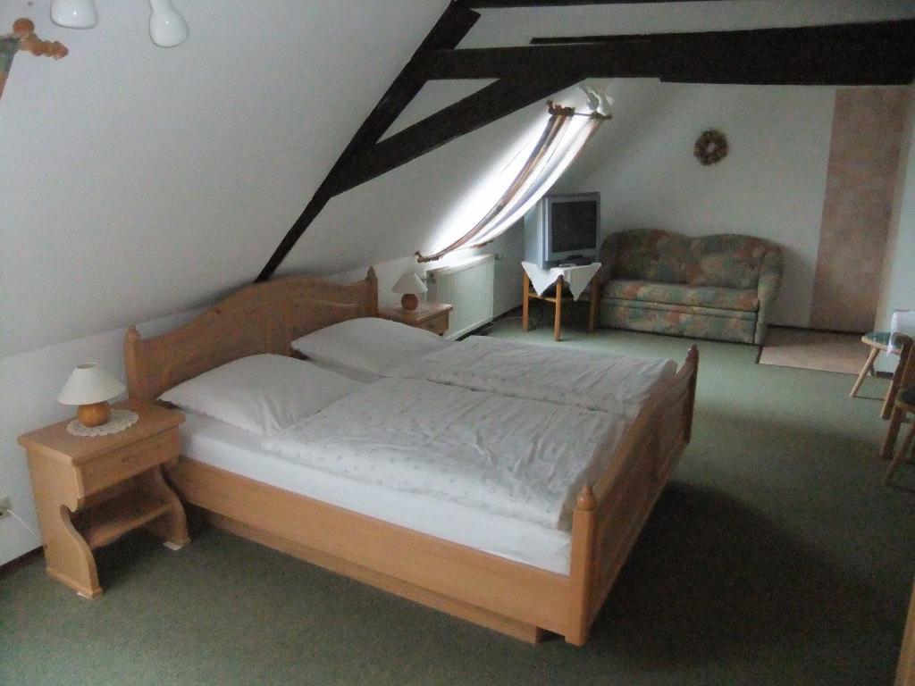 Postel nebo postele na pokoji v ubytování Gasthof Rotes Roß