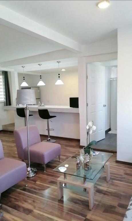 TV a/nebo společenská místnost v ubytování M Hoteles Concepto
