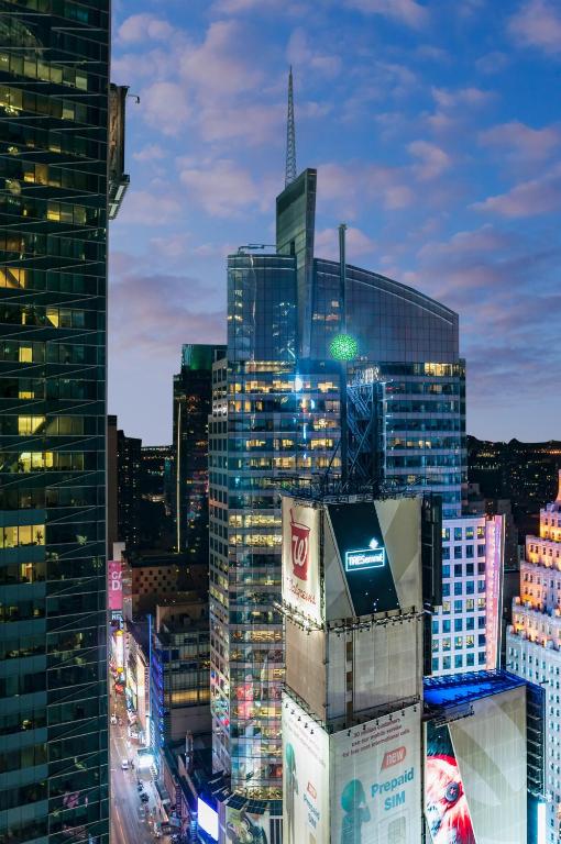 a view of a city skyline at night at M Social Hotel Times Square New York in New York