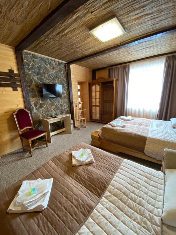 Postel nebo postele na pokoji v ubytování Guest house Shulc