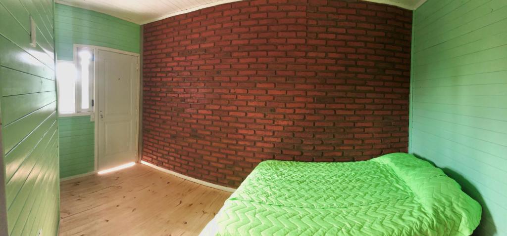 Cama o camas de una habitación en Hosteria NAMAJU