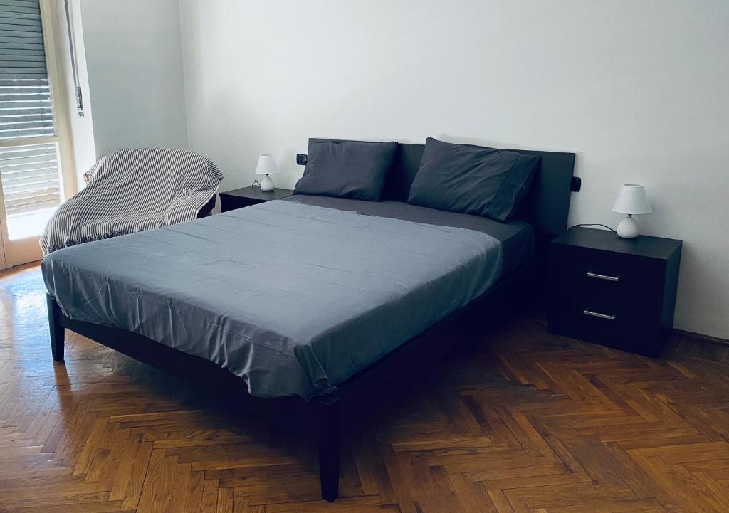 Cama ou camas em um quarto em Turin Apartment