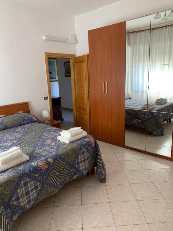 A bed or beds in a room at Apartment Peretola Guest parking included
