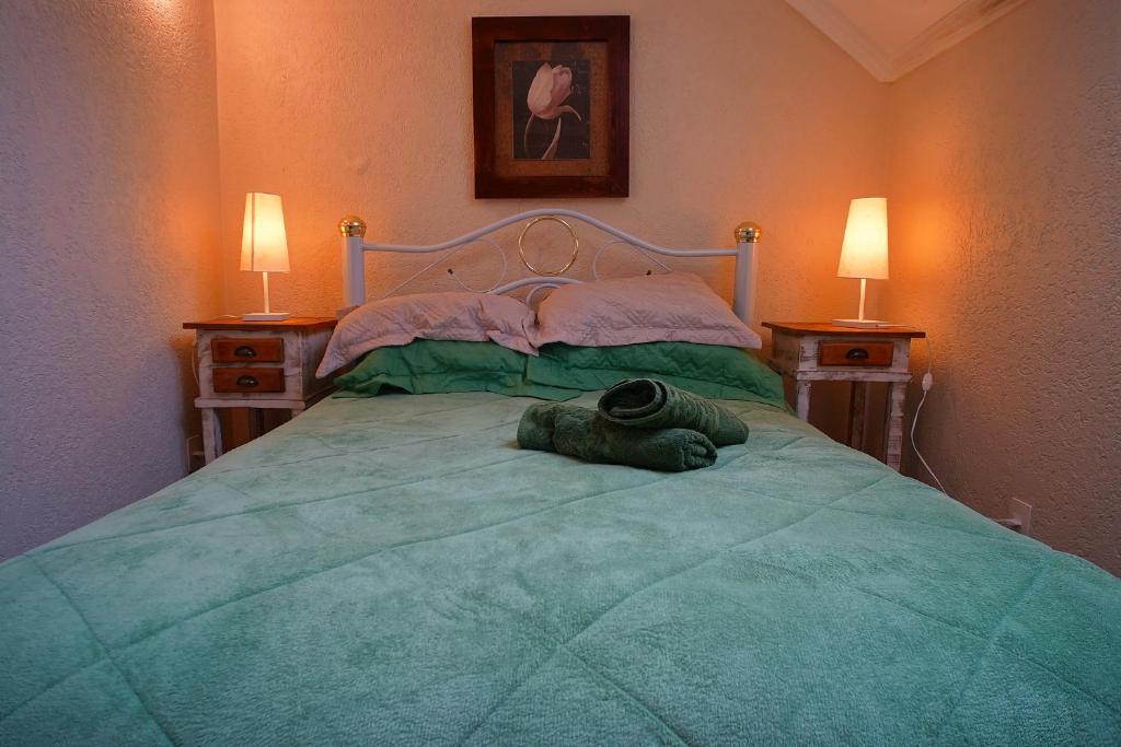Кровать или кровати в номере Apartamento Lago Negro