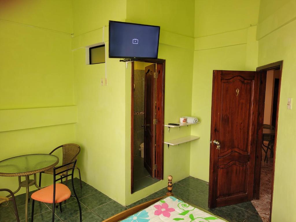 TV a/nebo společenská místnost v ubytování Hostal Haziel