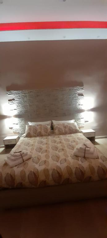 A bed or beds in a room at Vacanze Napoletane
