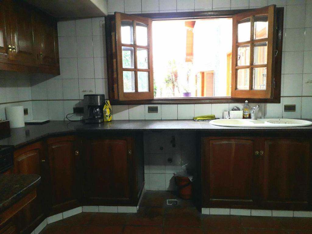 Kuchyň nebo kuchyňský kout v ubytování Tanino Guest House
