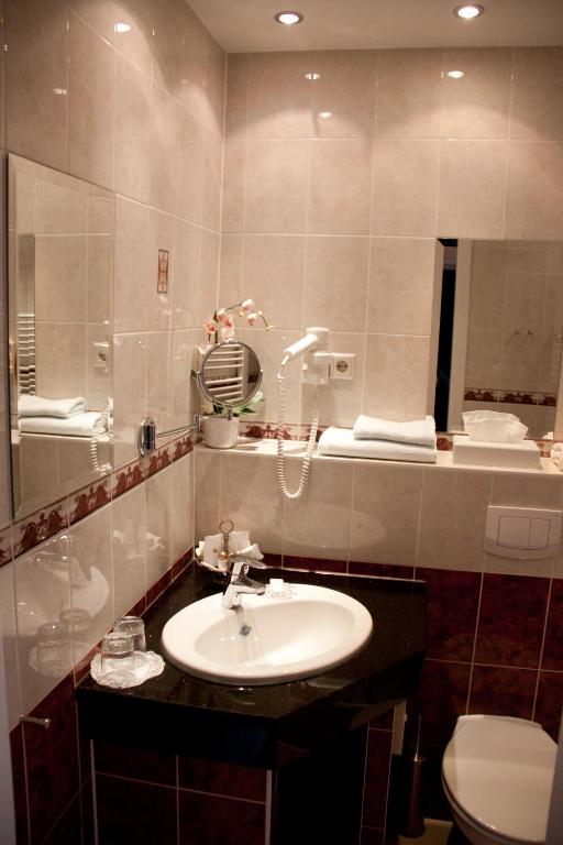 Koupelna v ubytování Hotel Don Giovanni