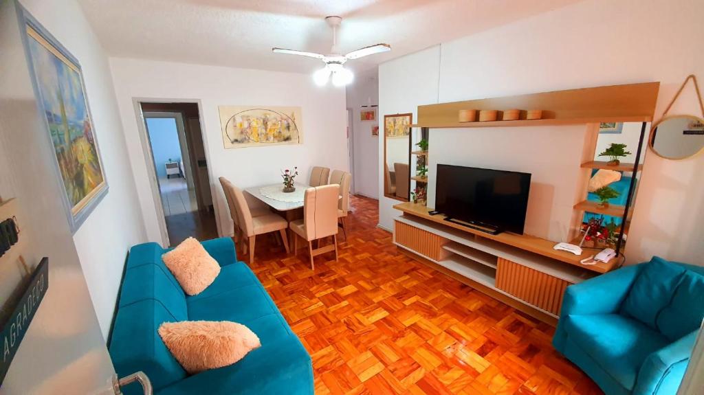 TV a/nebo společenská místnost v ubytování Apto 1 quadra do mar e centro