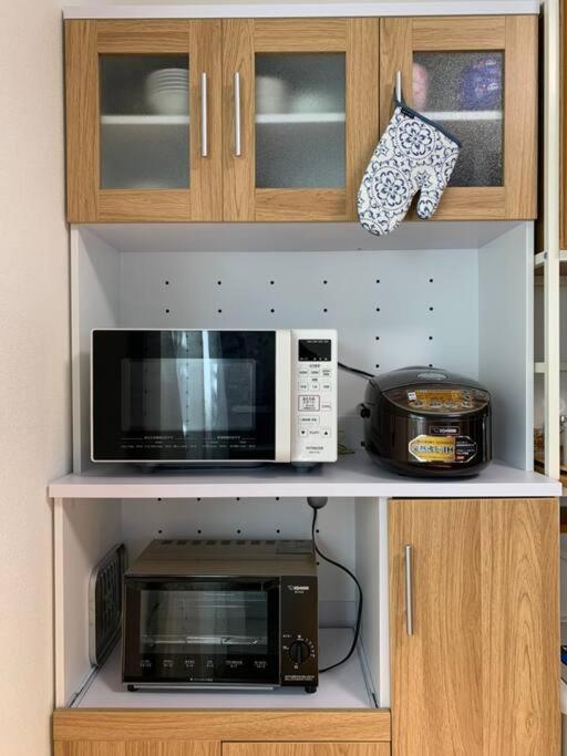 Kuchyň nebo kuchyňský kout v ubytování Nara Family HOUSE