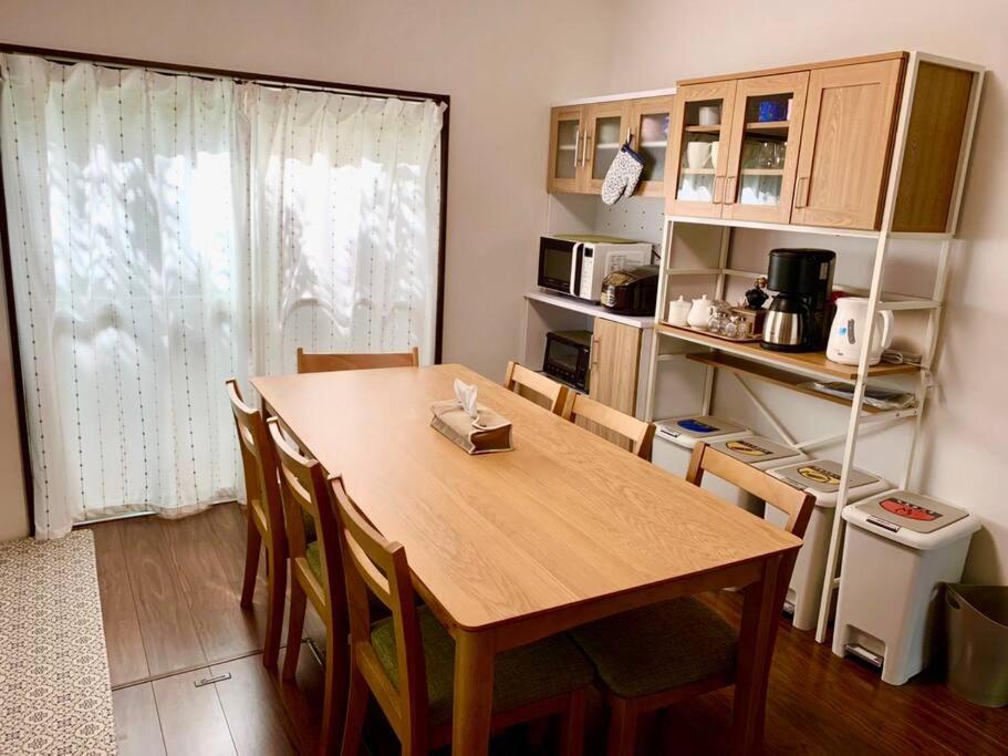 Kuchyň nebo kuchyňský kout v ubytování Nara Family HOUSE