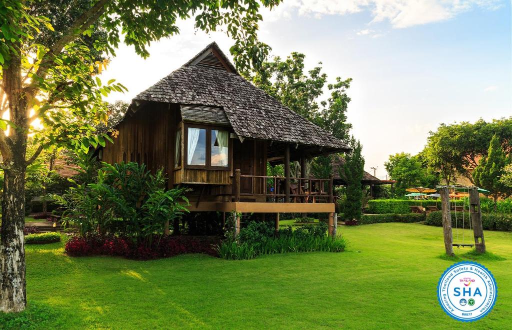 Zahrada ubytování Belle Villa Resort, Pai