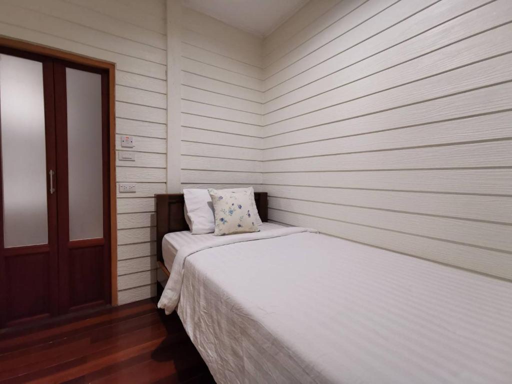 Postel nebo postele na pokoji v ubytování TAVEE Guesthouse