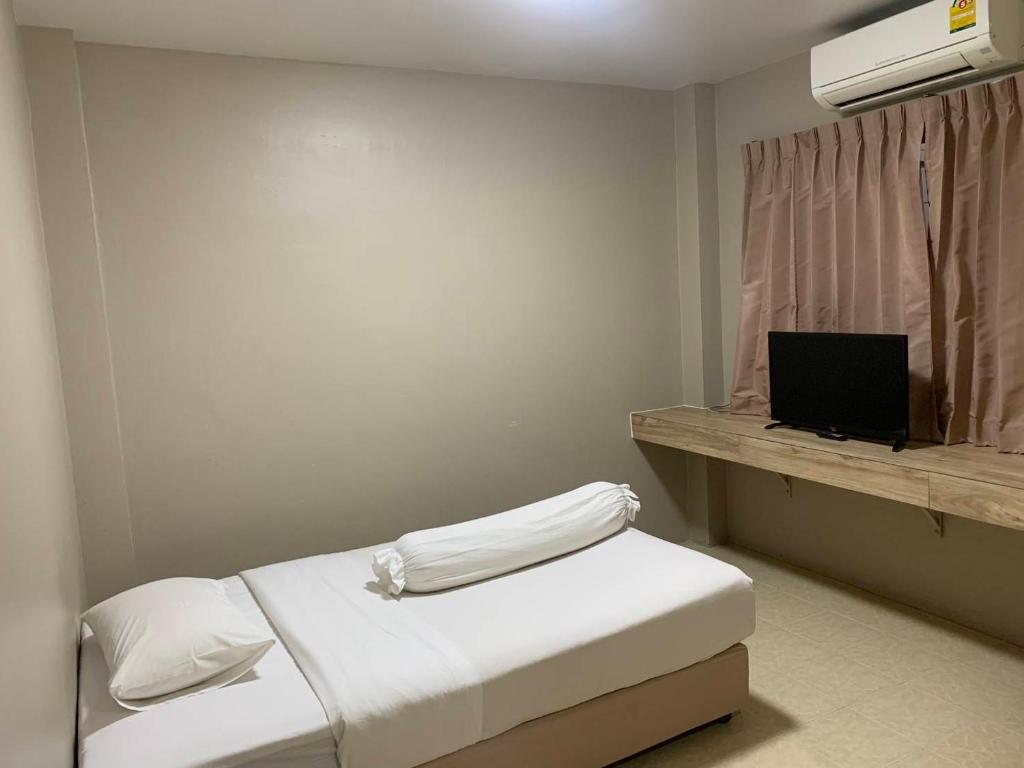 Postel nebo postele na pokoji v ubytování Lithai Guesthouse