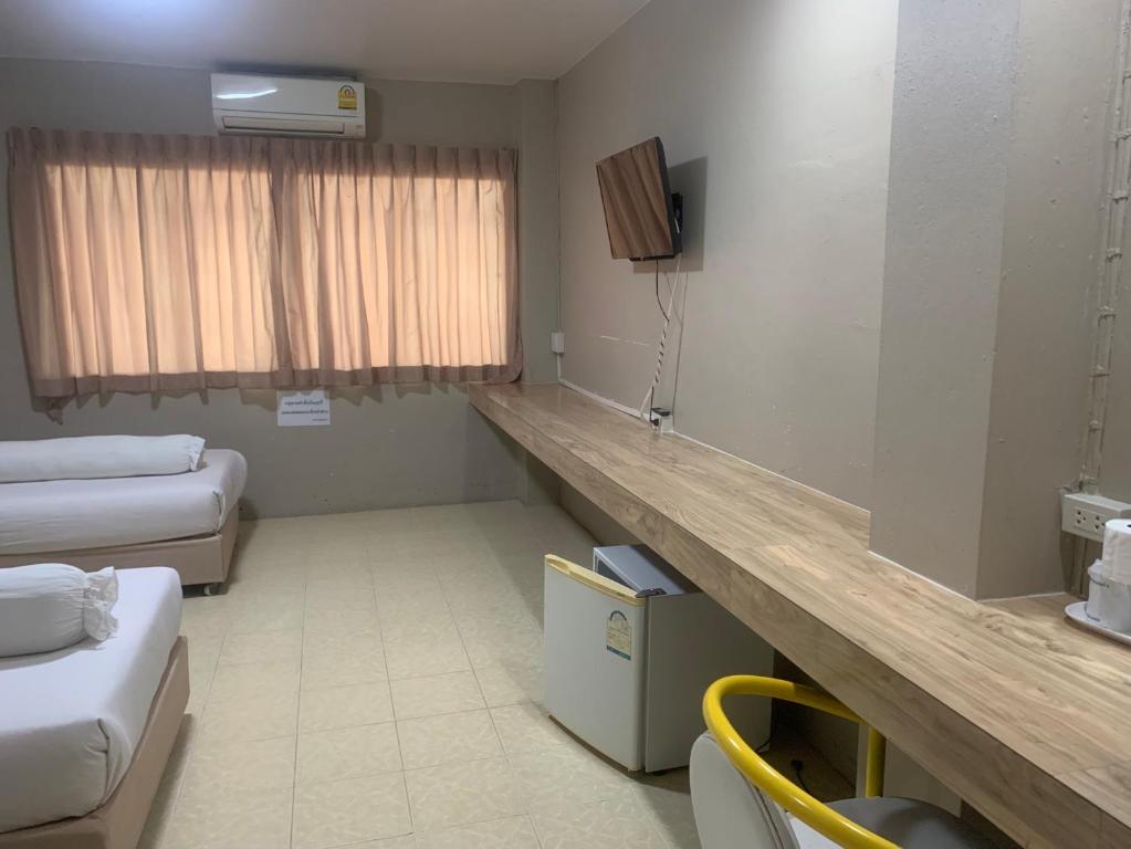 TV a/nebo společenská místnost v ubytování Lithai Guesthouse