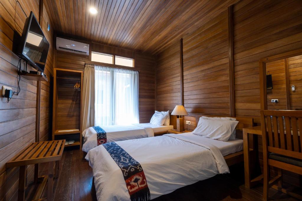 Postel nebo postele na pokoji v ubytování Casa Kandara