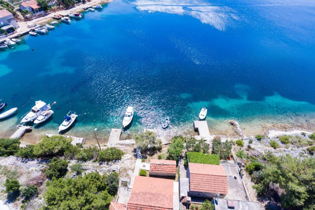 an aerial view of a harbor with boats in the water at Holiday Home Magazin in Slano