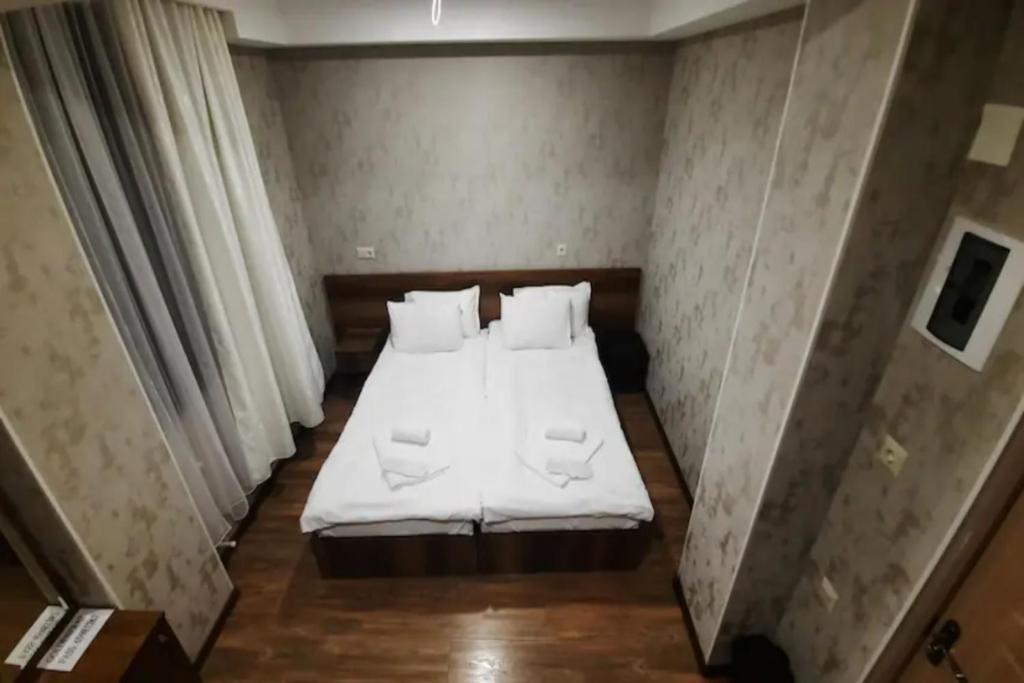 Postel nebo postele na pokoji v ubytování Hotel Goldenera