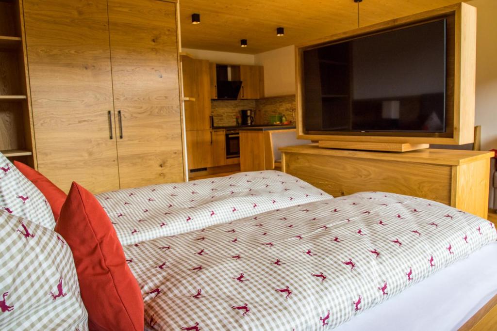 Posteľ alebo postele v izbe v ubytovaní Sonnenappartements Madlstatthof