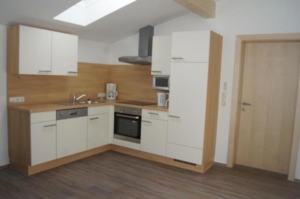 Kuchyňa alebo kuchynka v ubytovaní Gertis Appartment Top 2
