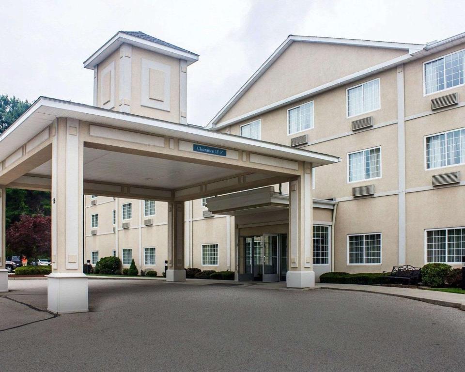 a large building with a pavilion in front of it at Comfort Inn & Suites in Dayville