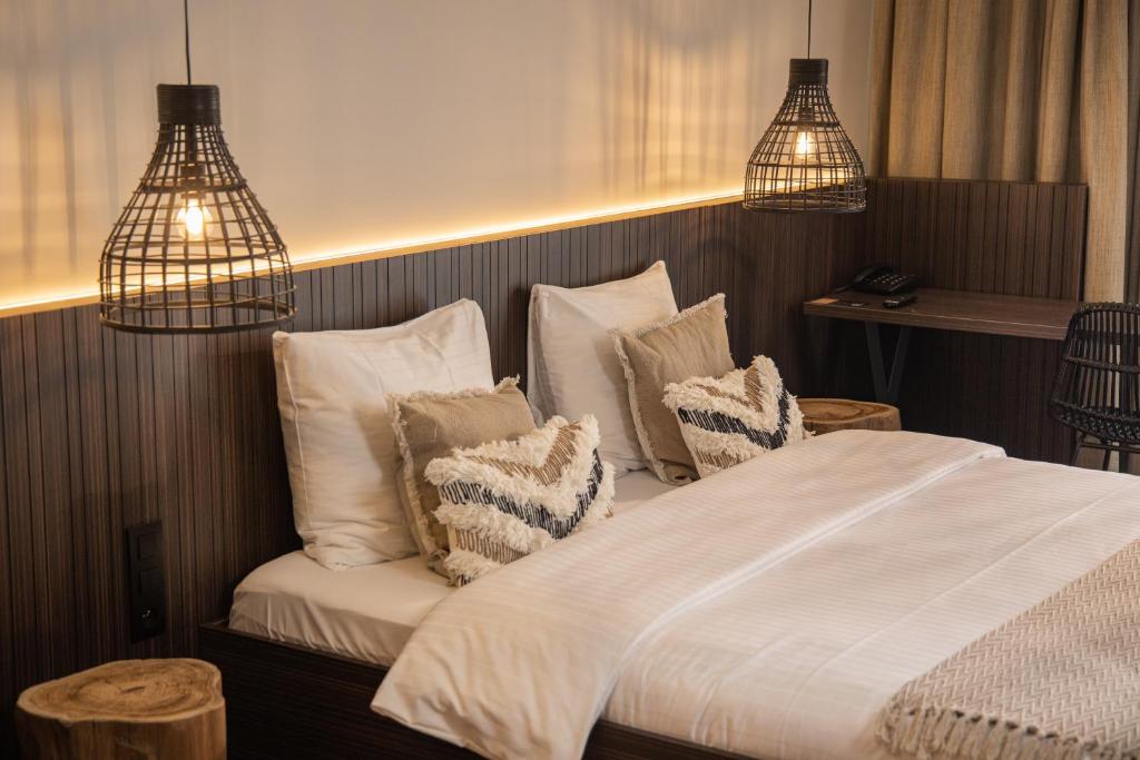 Postel nebo postele na pokoji v ubytování Van der Valk Hotel Beveren