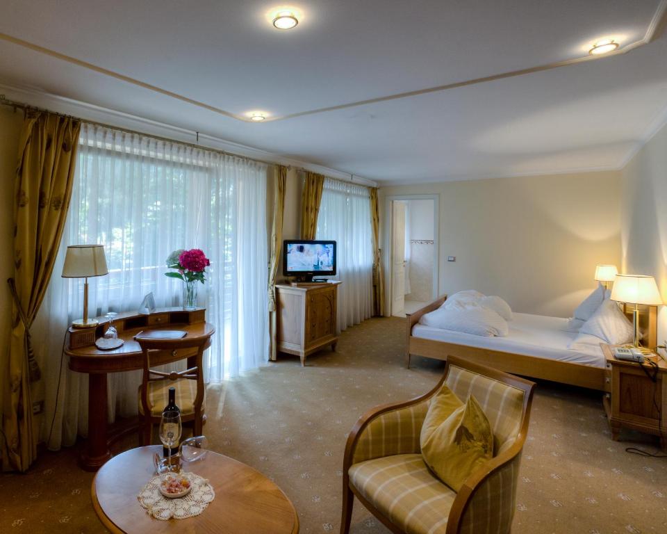 Postel nebo postele na pokoji v ubytování Hotel Aster