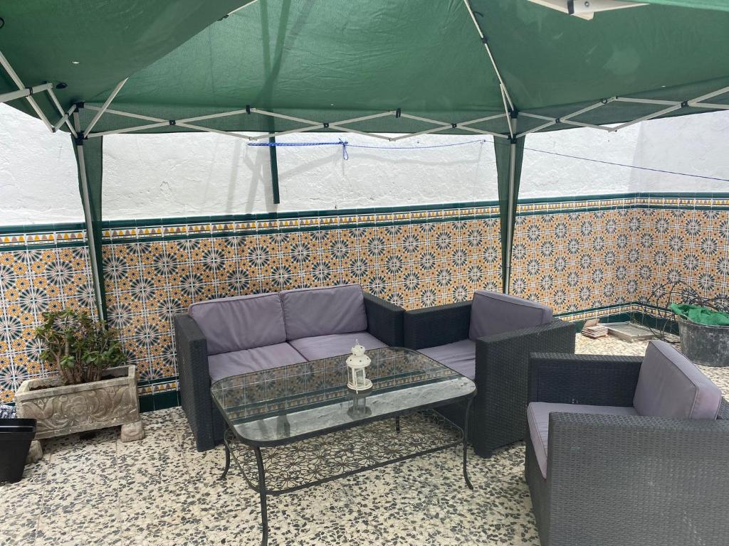 Posedenie v ubytovaní CASA REFORMADA CON TERRAZA/WIFI/AIRE ACONDICIONADO