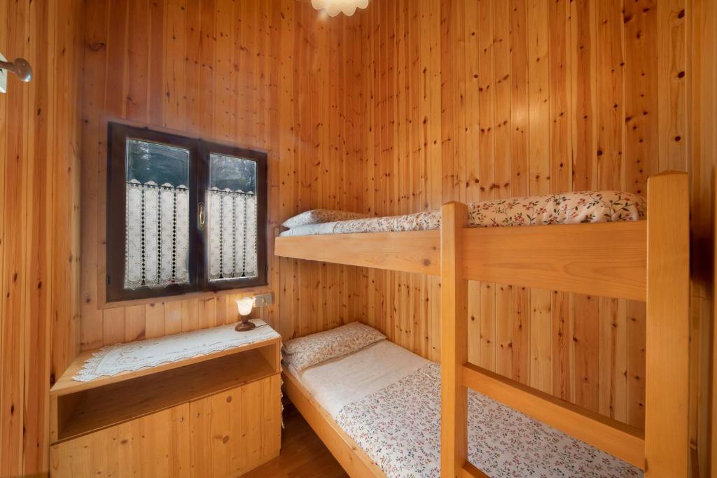 Postel nebo postele na pokoji v ubytování Casa Bucaneve