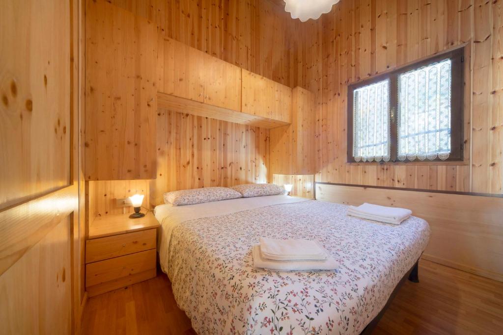 Postel nebo postele na pokoji v ubytování Casa Bucaneve