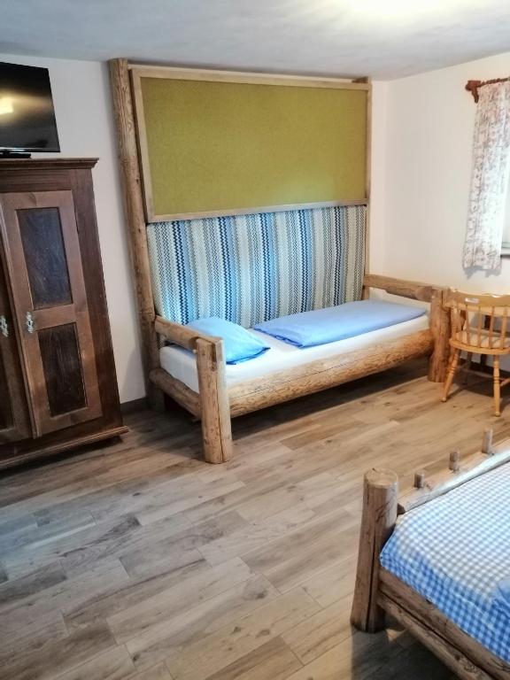 Postel nebo postele na pokoji v ubytování Berggasthof Pechhäusl