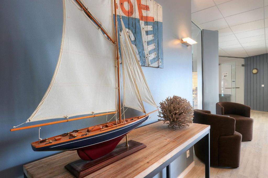 Posezení v ubytování Best Western Hôtel Le Bellevue Quiberon