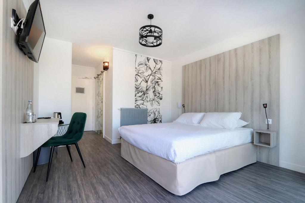 Postel nebo postele na pokoji v ubytování Best Western Hôtel Le Bellevue Quiberon