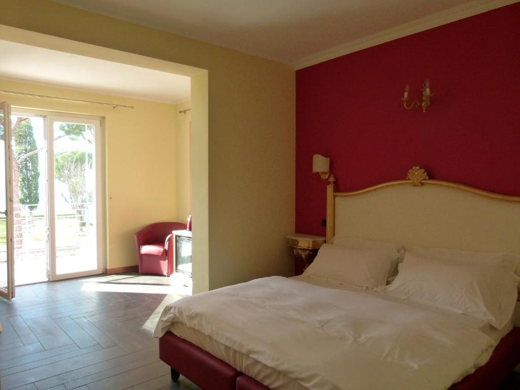 Postel nebo postele na pokoji v ubytování Boutique Hotel Bel Sito Wellness & Private SPA