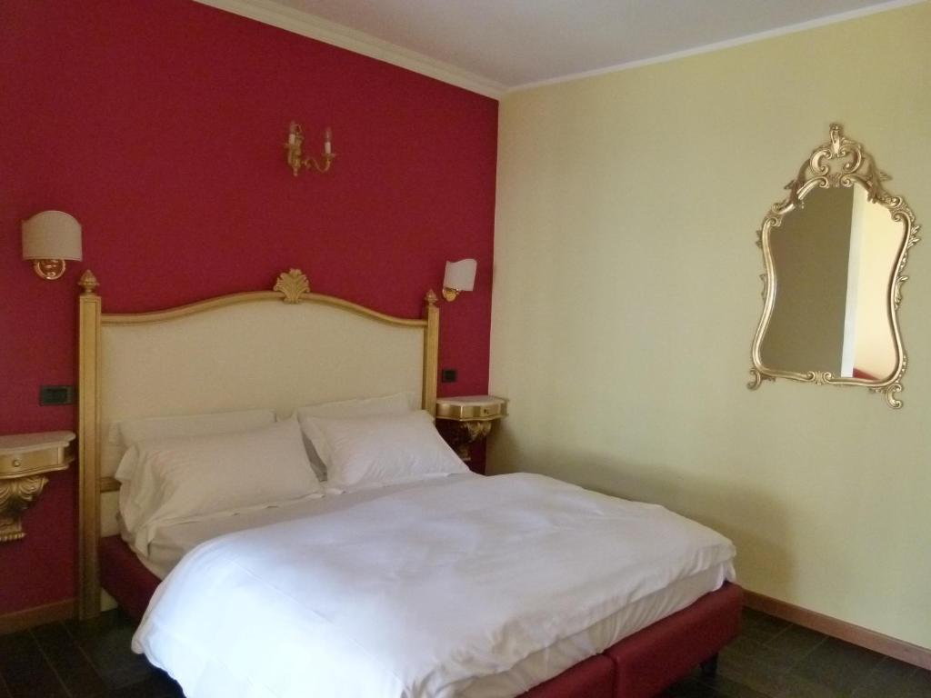 Postel nebo postele na pokoji v ubytování Boutique Hotel Bel Sito Wellness & Private SPA