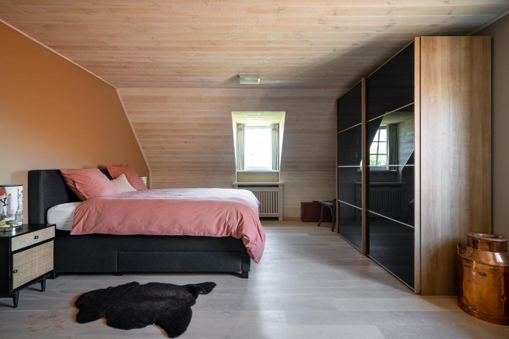 Postel nebo postele na pokoji v ubytování B&B De Hemelse Polder