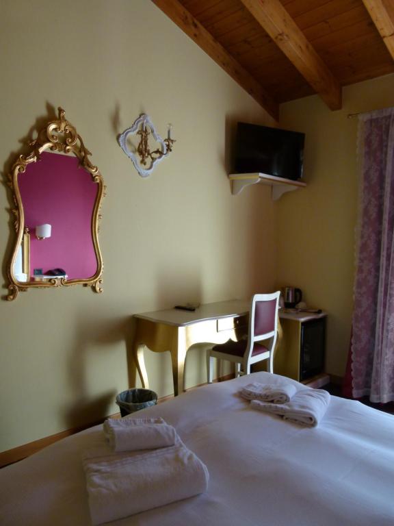 Postel nebo postele na pokoji v ubytování Boutique Hotel Bel Sito Wellness & Private SPA