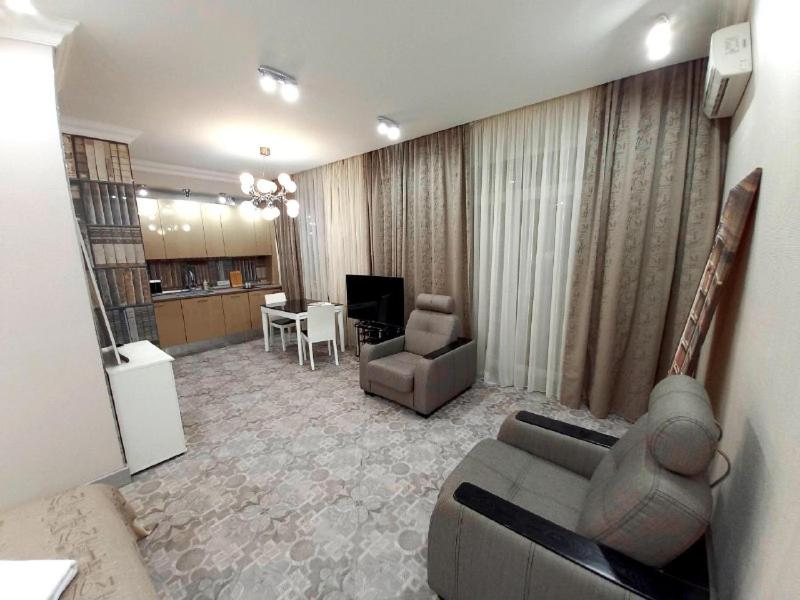 Η κουζίνα ή μικρή κουζίνα στο Inn Home Apartments-Olimpiysky Stadium area