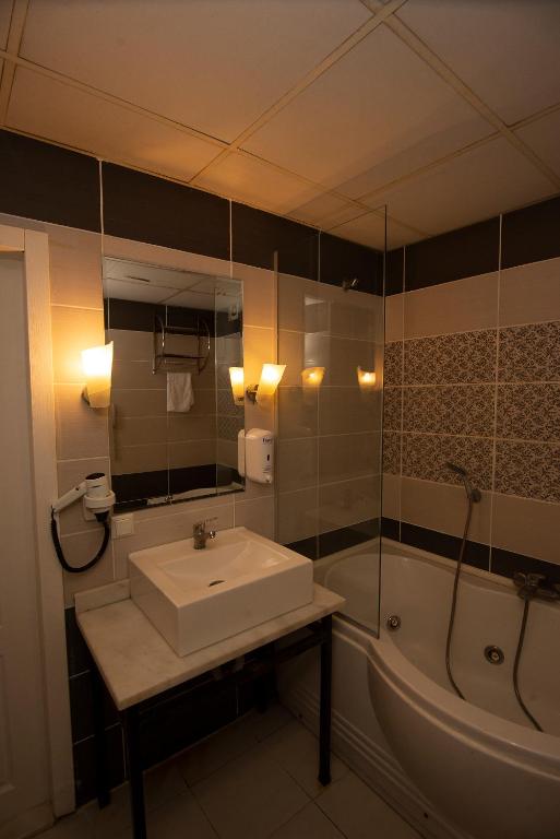 Koupelna v ubytování SRF Hotel