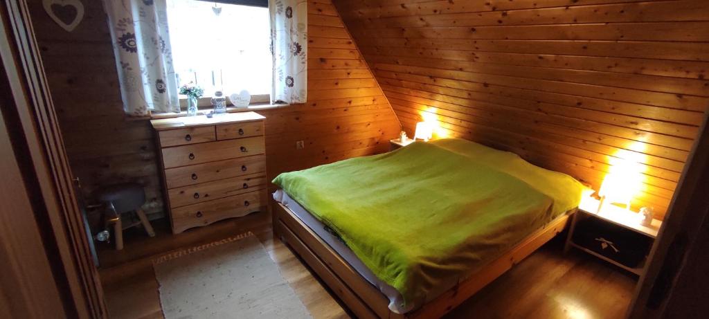 Postel nebo postele na pokoji v ubytování Domek Mateo