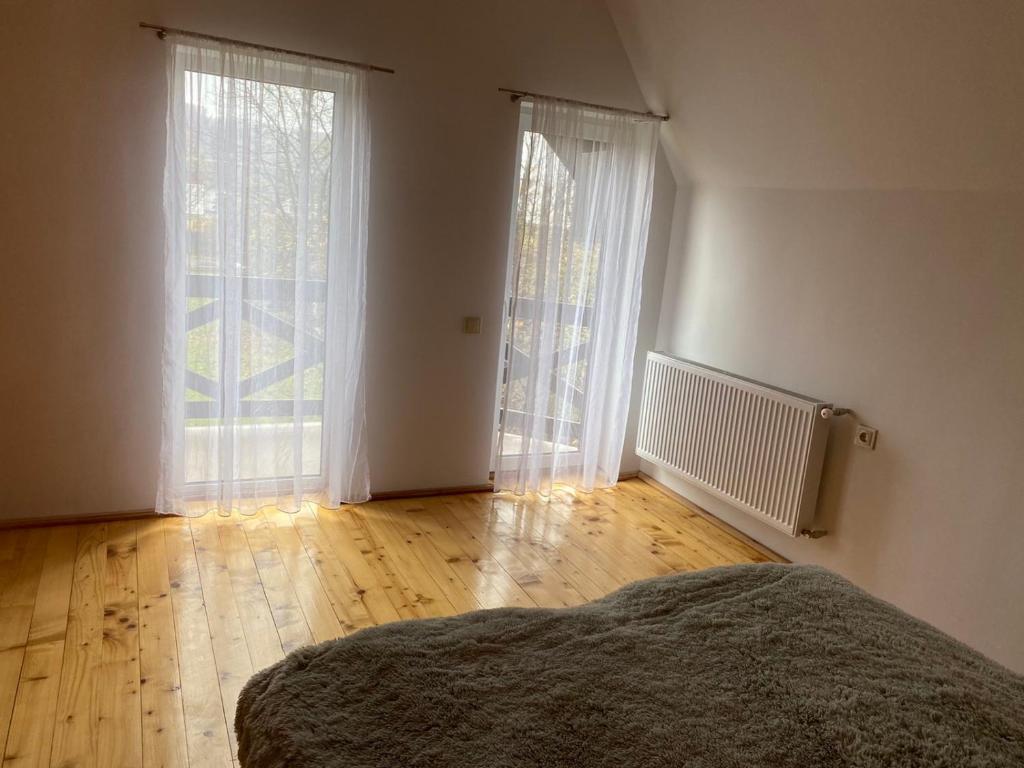 Postel nebo postele na pokoji v ubytování Rest House 6A