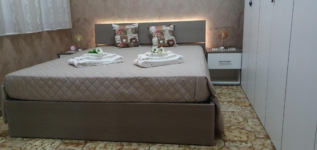 Łóżko lub łóżka w pokoju w obiekcie Villa Laura