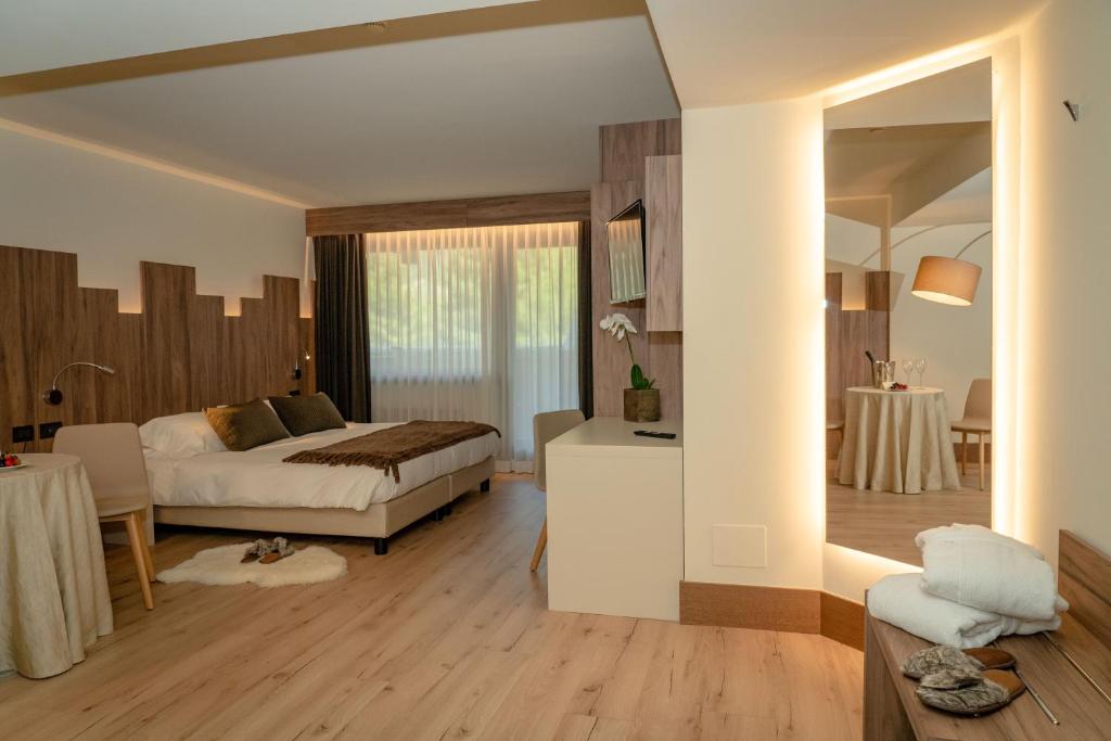 Postel nebo postele na pokoji v ubytování Palace Hotel Wellness & Beauty