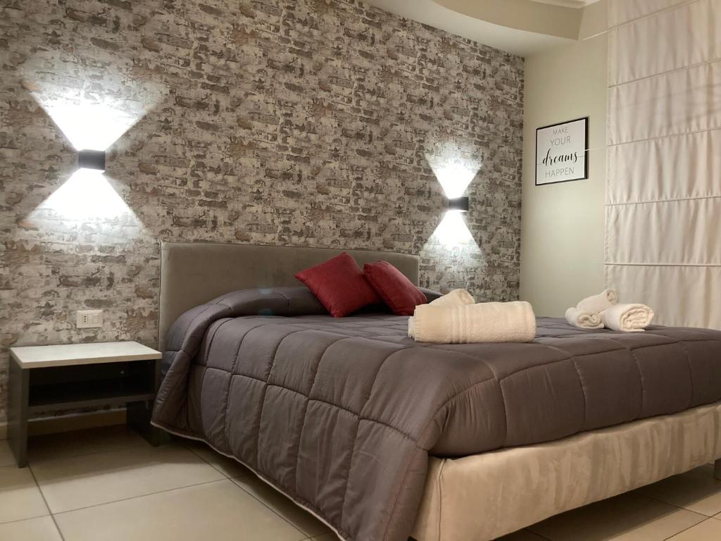 Postel nebo postele na pokoji v ubytování Hotel IL DIRETTO