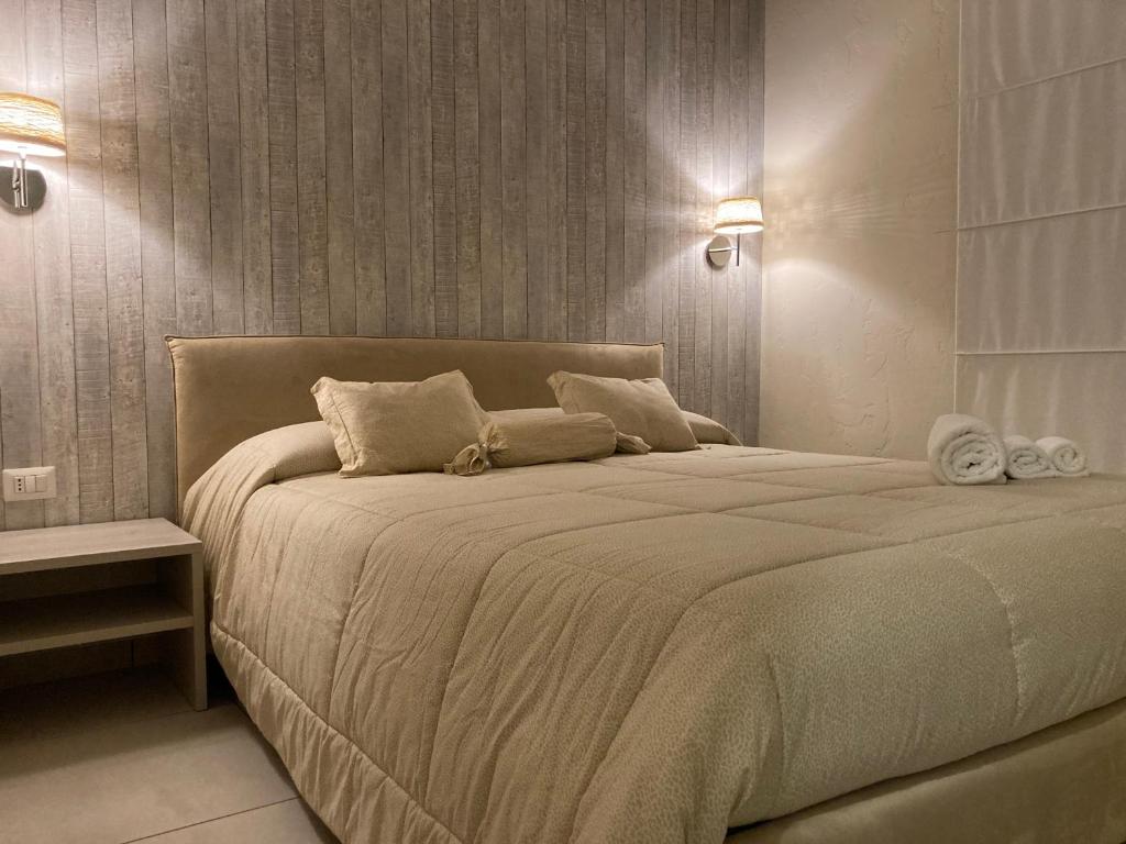 Postel nebo postele na pokoji v ubytování Hotel IL DIRETTO