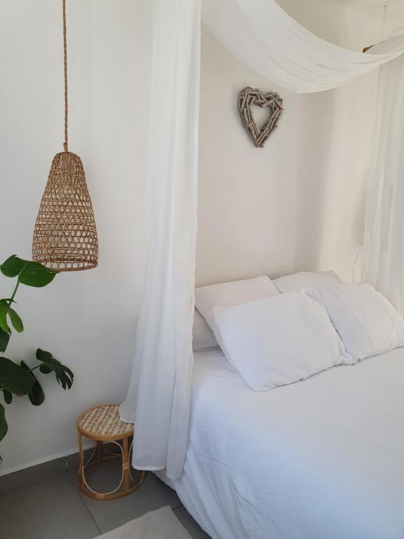 Postel nebo postele na pokoji v ubytování Une Nuit à Bali - Appartement cocooning
